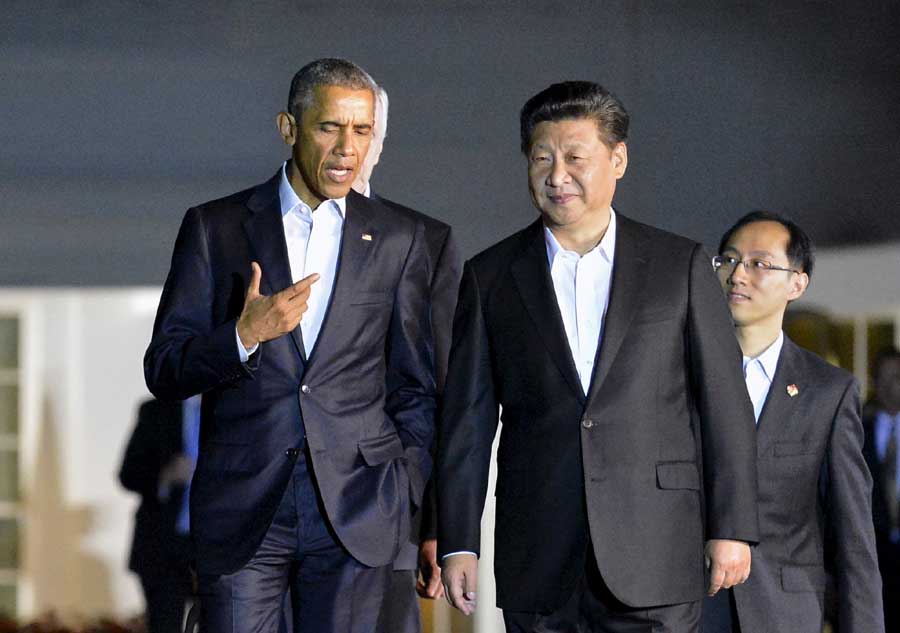 President Xi welcomed by Obama as he arrives in Washington DC