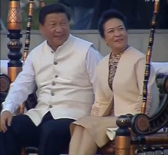 President Xi and wife play swing in Modi's home state
