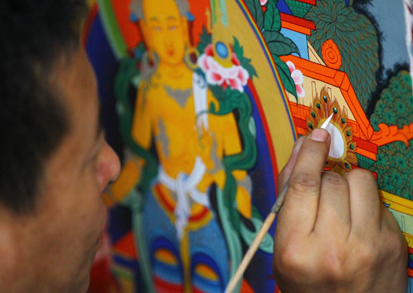 Thangka craftsmen re-create religious icons