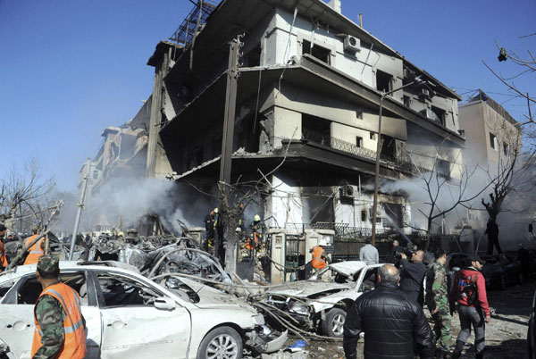 Blasts in Syrian capital kill 27