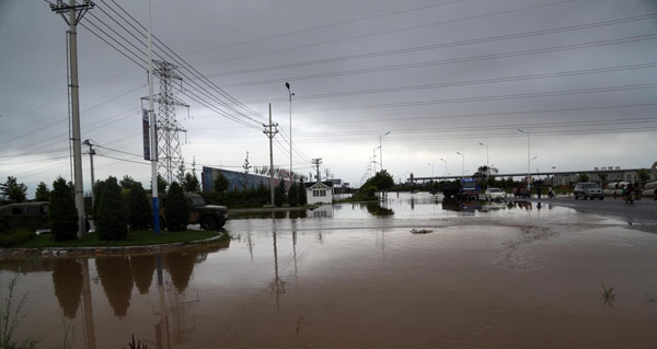 Typhoon-caused flood disrupts trains in Liaoning