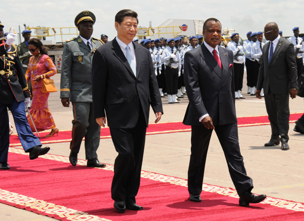 President Xi Jinping is welcomed by Denis Sassou Nguesso, president of the Republic of Congo, at an airport in the country’s capital Brazzaville on Friday. LAUDES MARTIAL MBON / AGENCE FRANCE-PRESSE Xi hails China-Congo ties as 'model of cooperation'