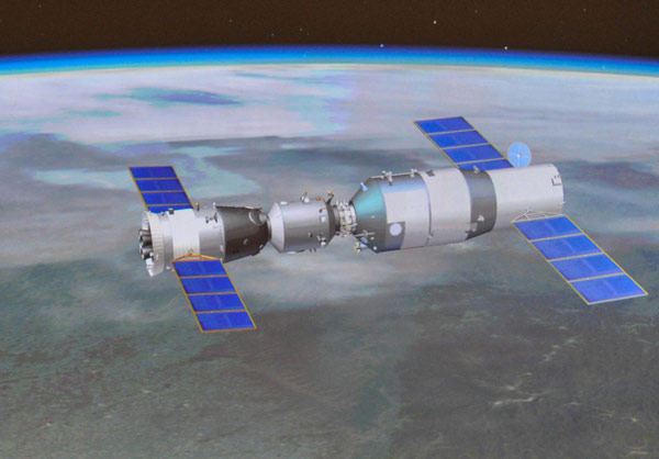China's Shenzhou X manned spacecraft successfully completed an automated docking procedure with the orbiting Tiangong-1 space module at 1:18 pm Thursday, according to the Beijing Aerospace Control Center. Astronauts of Shenzhou-X enter Tiangong-1
