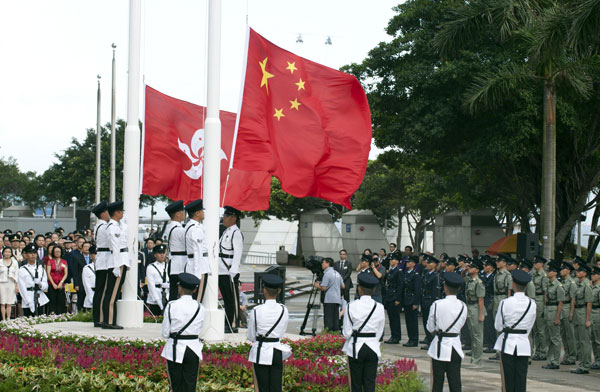 A flag raising ceremony is held by the Hong Kong government to mark the 16th anniversary of the Special Administrative Region's return to China. CY Leung: Govt seeks change, maintains stability