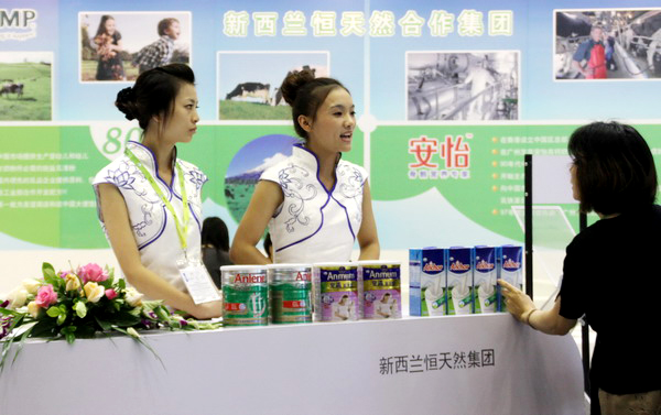 Fonterra Cooperative Group Ltd promotes its milk powder products at a dairy expo in Beijing. The New Zealand dairy giant said its products are safe after media reported that trace chemical residues were detected in its products. China names importers of NZ dairy products