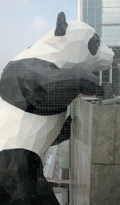 Giant panda scales Chengdu mall