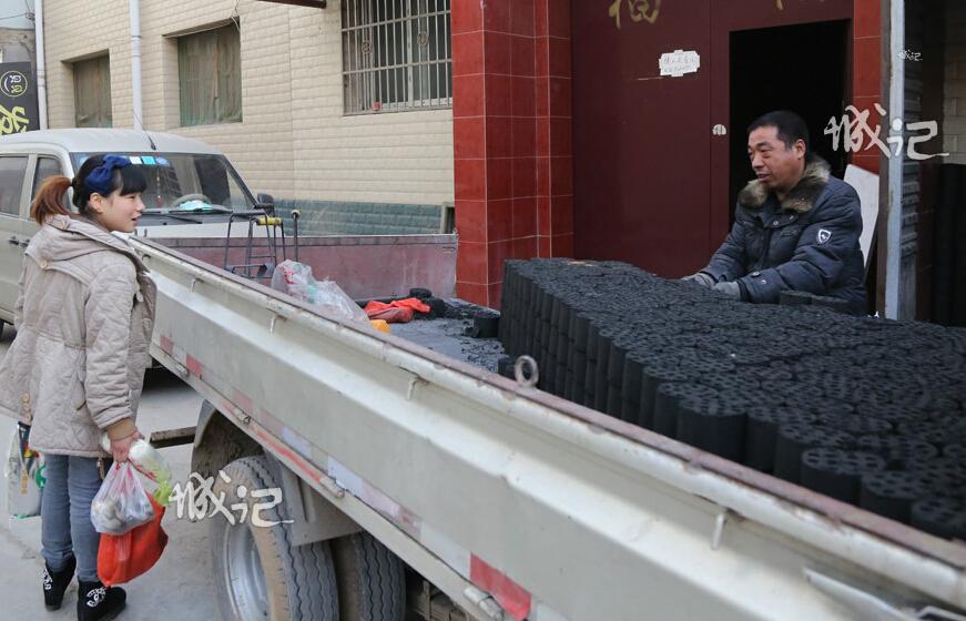 Coal haulers in city: to warm the winter