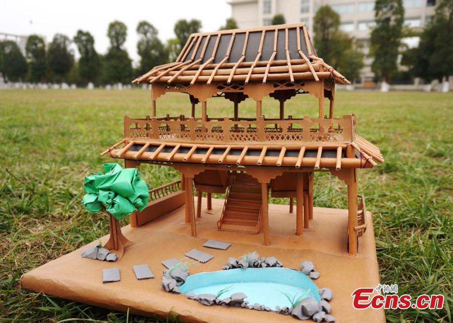 Students create 'villas' with small wooden sticks