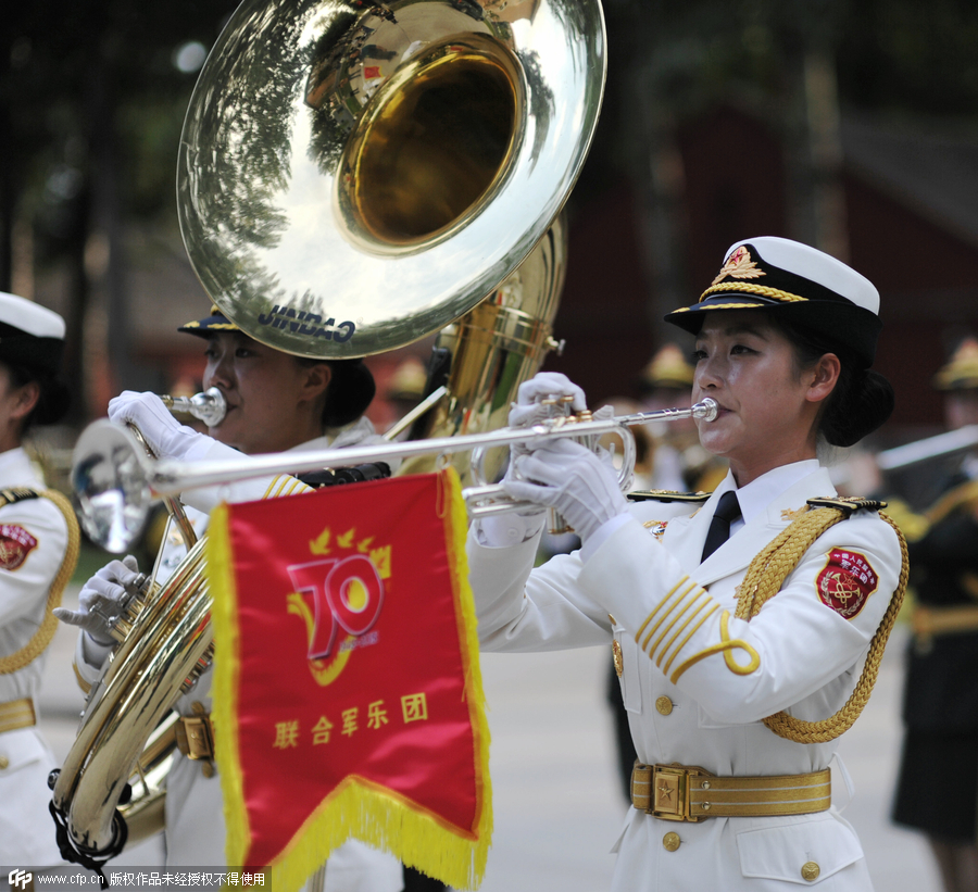 Female soldiers of military band practice for the V-Day parade