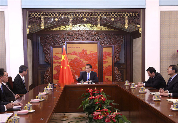 Premier Li avows firm adherence to 