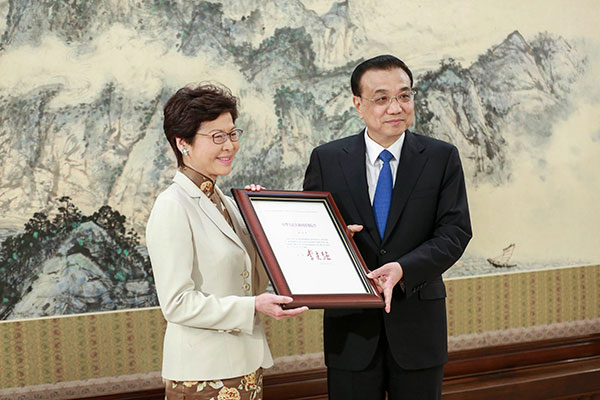Premier Li grants appointment certificate to incoming HKSAR chief executive