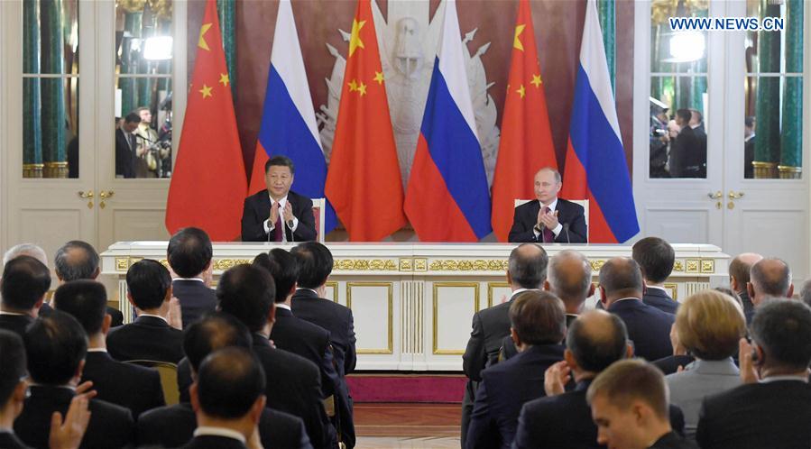 China, Russia pledge to play role of ballast stone for world peace