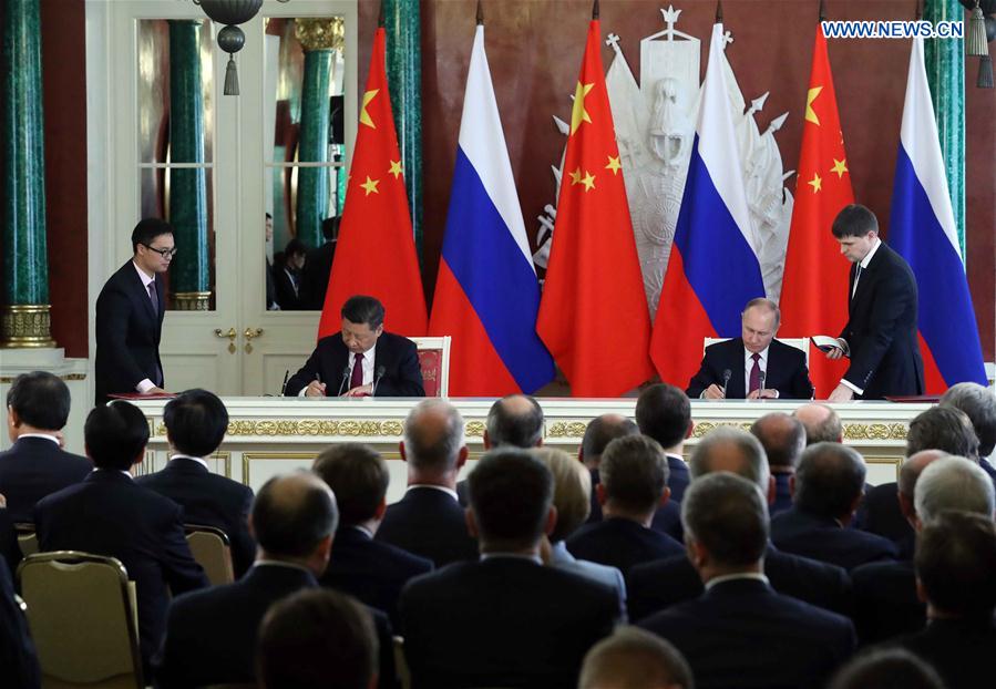 China, Russia pledge to play role of ballast stone for world peace