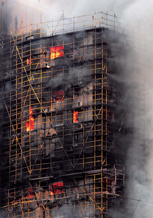 49 killed in Shanghai as fire engulfs high-rise