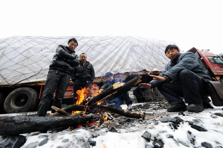 Stranded passengers endure cold