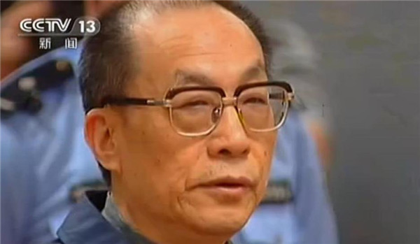 A screenshot from China's Central Television shows former railways minister Liu Zhijun standing trial in a court in Beijing on Sunday. Former railways minister stands trial