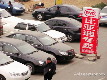 Nagged by slow sales, BYD slashes prices