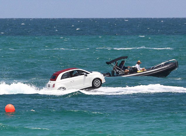 Fiat cars swimming off coast