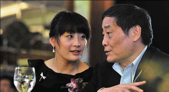 Kelly Zong, the daughter of Zong Qinghou, chairman of Hangzhou Wahaha Group Co Ltd and the richest man on the mainland, attends a ceremony with her father ... - 00221910dbbd149cac7938