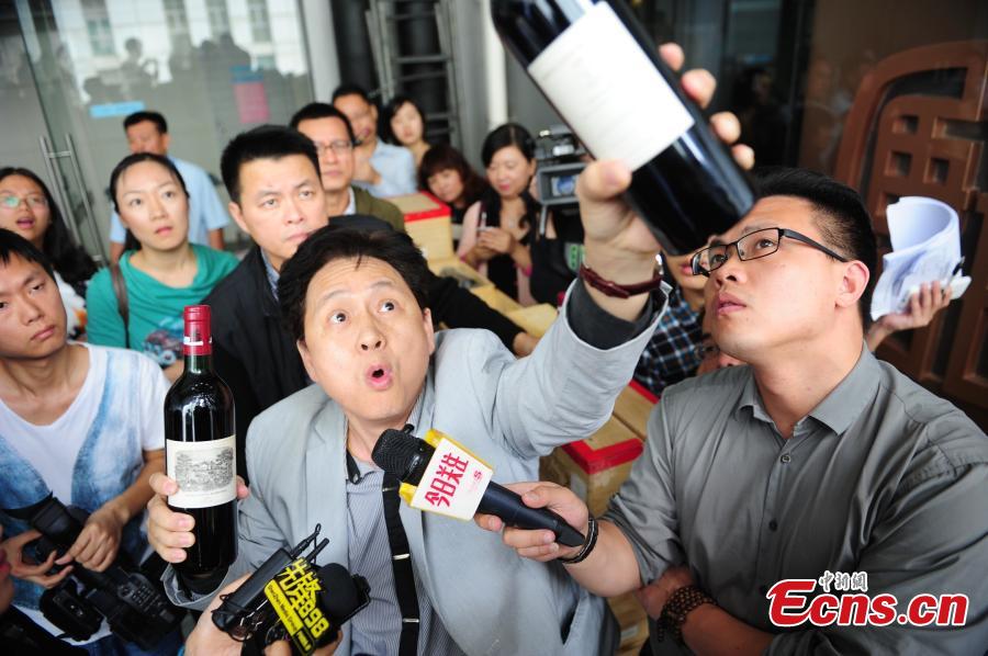 Wine dealer smashes fake Chateau Lafite in Shenzhen