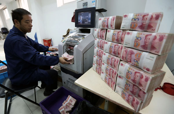 PBOC cuts rates to ease business financing