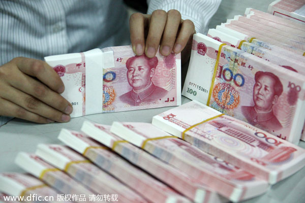 China's outstanding yuan loans up 14% by March