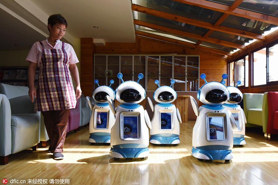 Robots help elderly in nursing home in east China