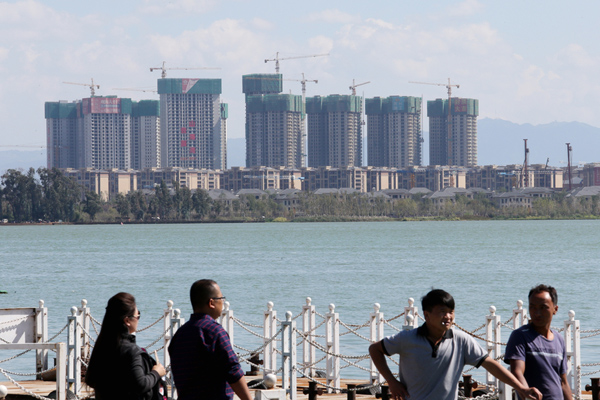 China warns of property-related financial risks