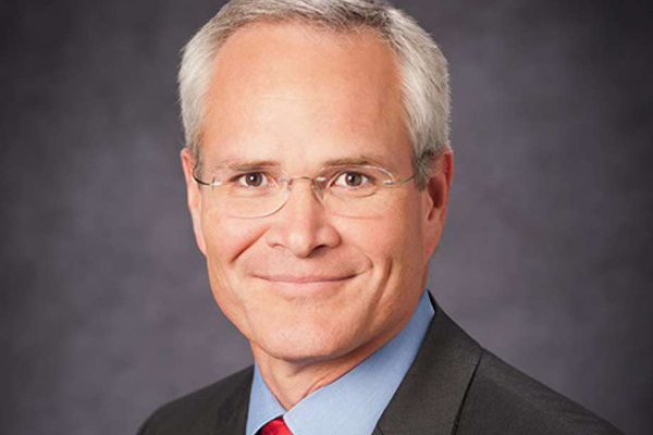 ames Darren Woods as new boss to replace R