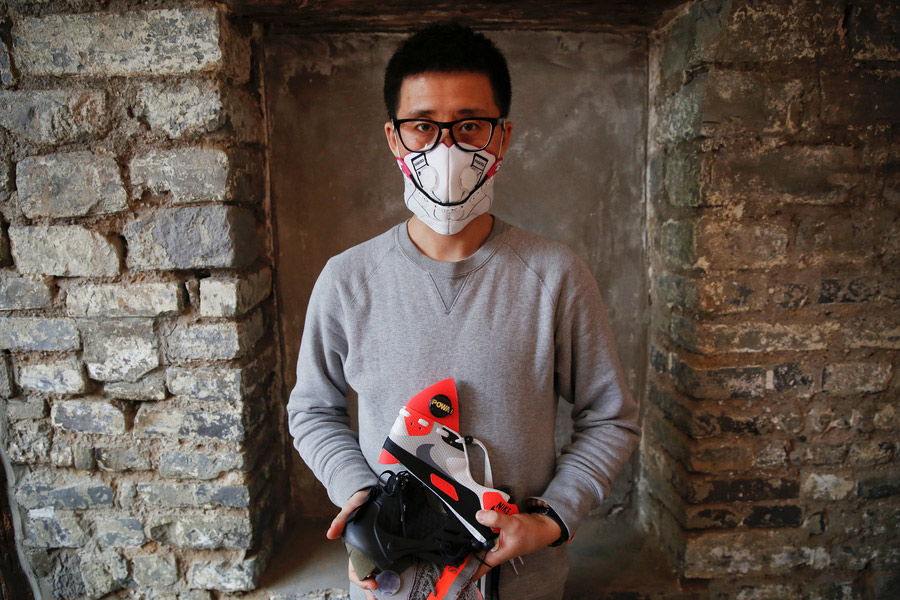 Beijing designer turns sneakers into smog masks