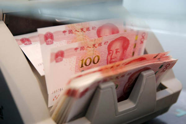 Yuan continues strong showing against dollar