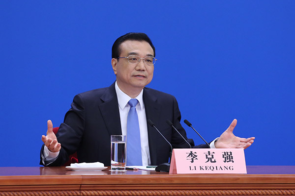 China has many tools to resolve financial risks, says Premier Li