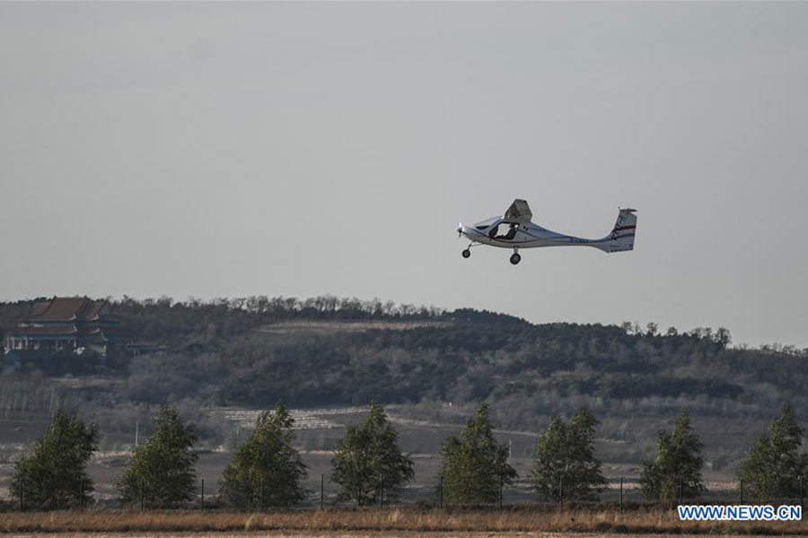 China's 1st electric plane makes maiden flight