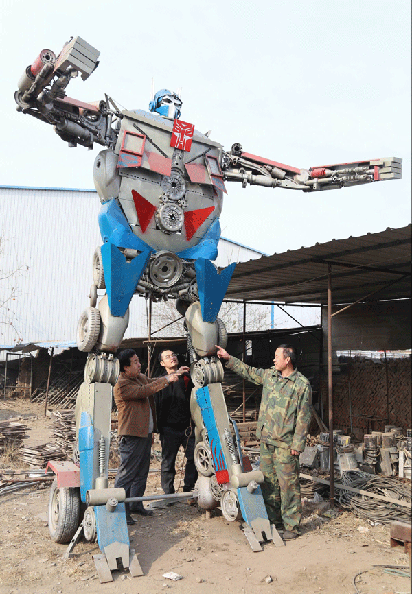 Father makes Transformer figures for son