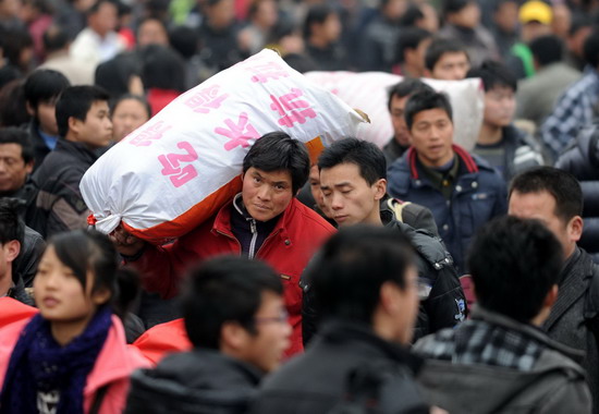 Back again, mass migration tests China's rails