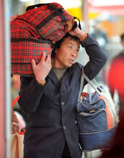 Back again, mass migration tests China's rails