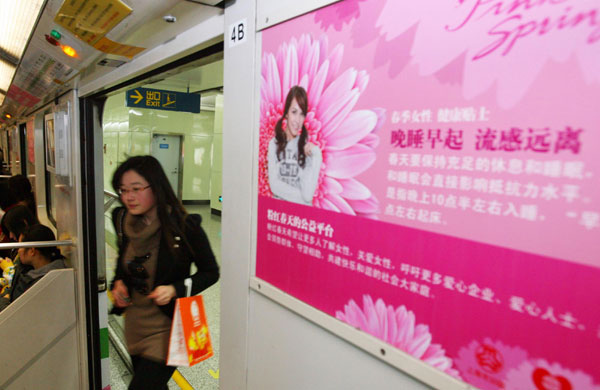Women ride the first pink subway