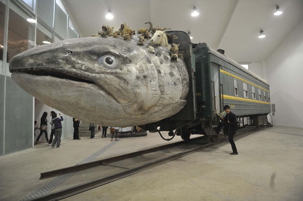 Fish-headed train steams into art gallery