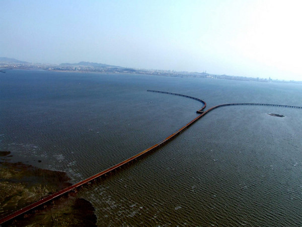 China opens world's longest sea bridge