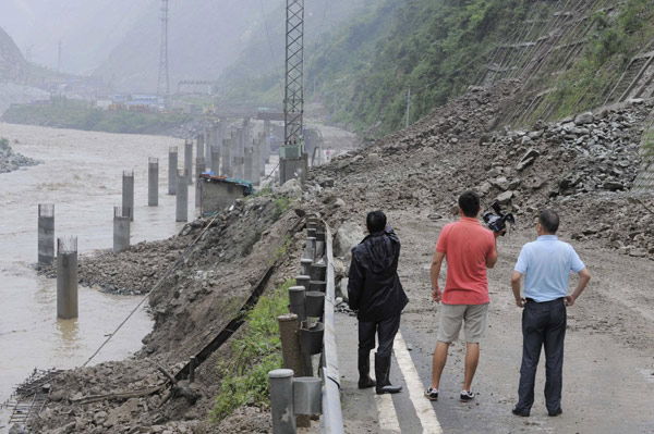 Cave-ins hinder efforts to repair damaged highway