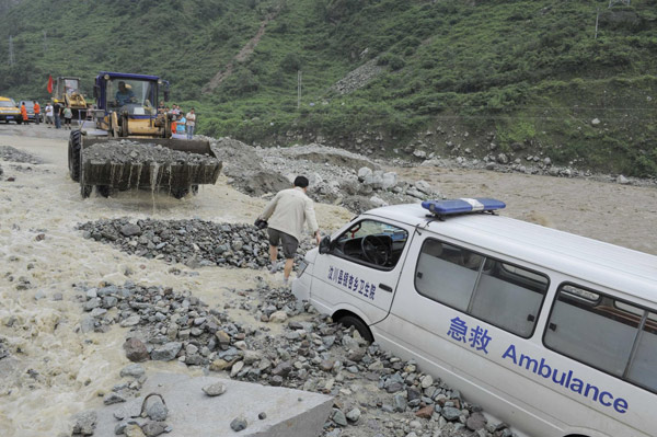 Cave-ins hinder efforts to repair damaged highway