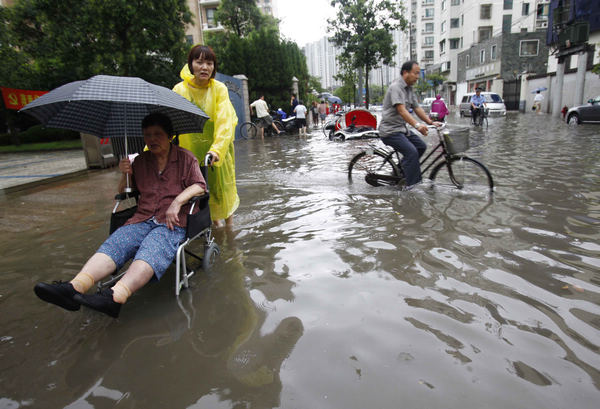 Heavy rain hits downtown Shanghai