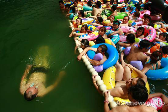 Summer swimmers soak in salty waters