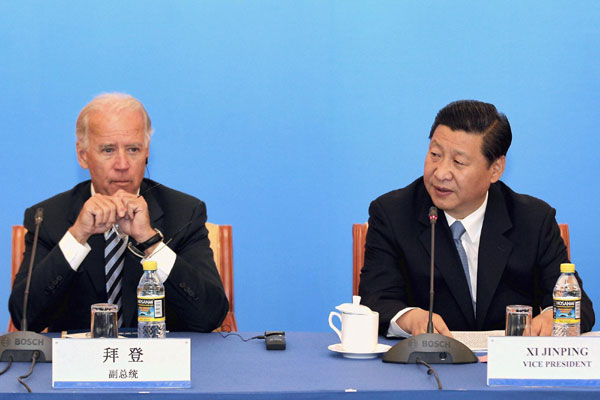 Xi, Biden talks business issues in Beijing
