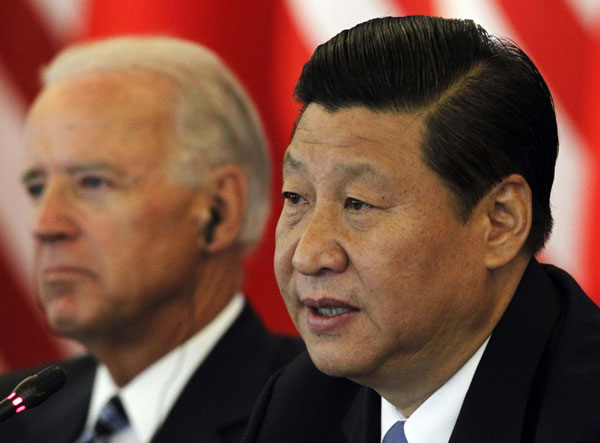 Xi, Biden talks business issues in Beijing