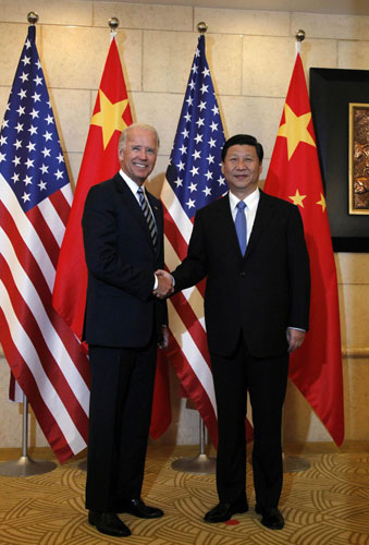 Xi, Biden talks business issues in Beijing