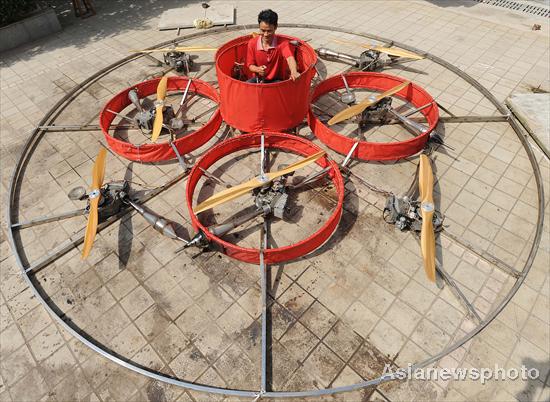 Peasant works on construction of flying saucer