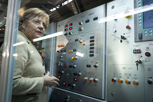 Wen, Merkel visit tunnelling equipment Co in Guangzhou