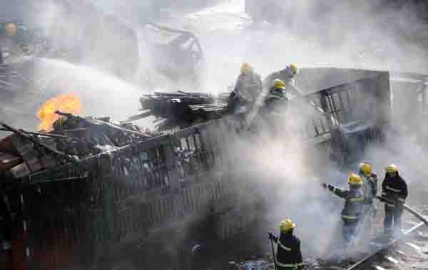 One dead after eight truck blaze