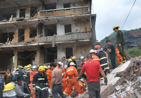 Garage blast kills nine, injures dozens Garage blast kills nine, injures dozens